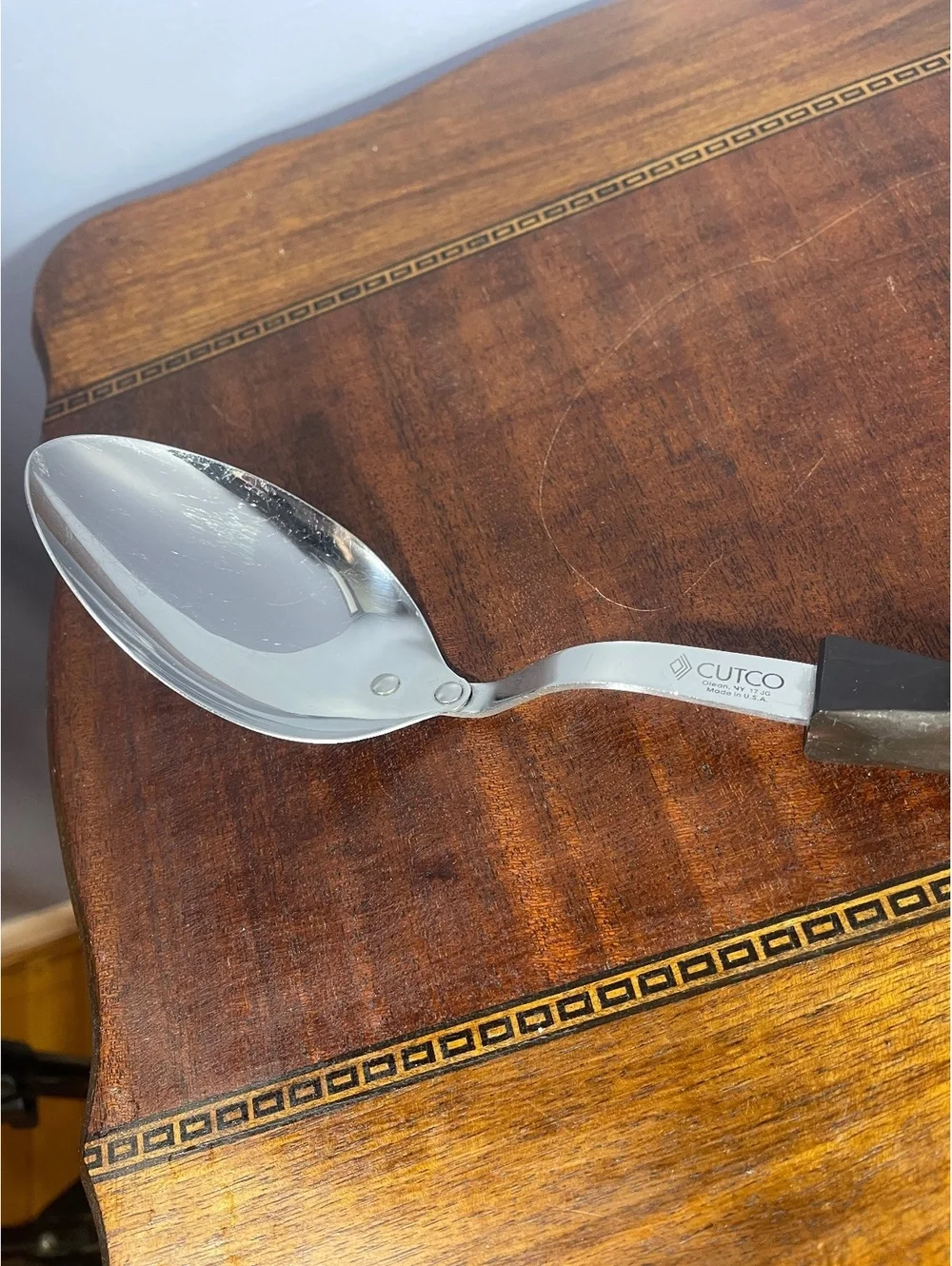 Cutco Vintage Stainless Steel Serving Spoon with Black Handle